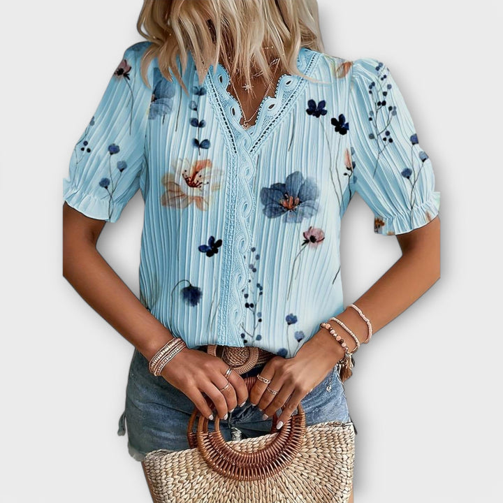 Olivia - Blusa elegante con un escote en V